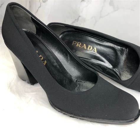 prada black pumps brown stripe|Prada classic black pumps.